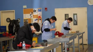Students in a workshop focused on hands-on training.